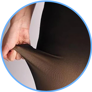 Hand gently stretching the leggings fabric to show its flexibility