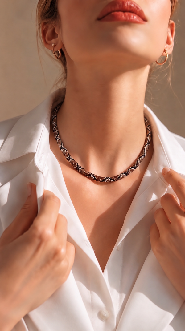 Woman wearing a bronze serpent necklace