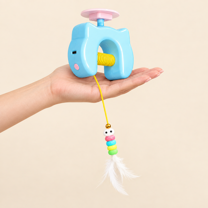 The toy held in an open hand to show its size