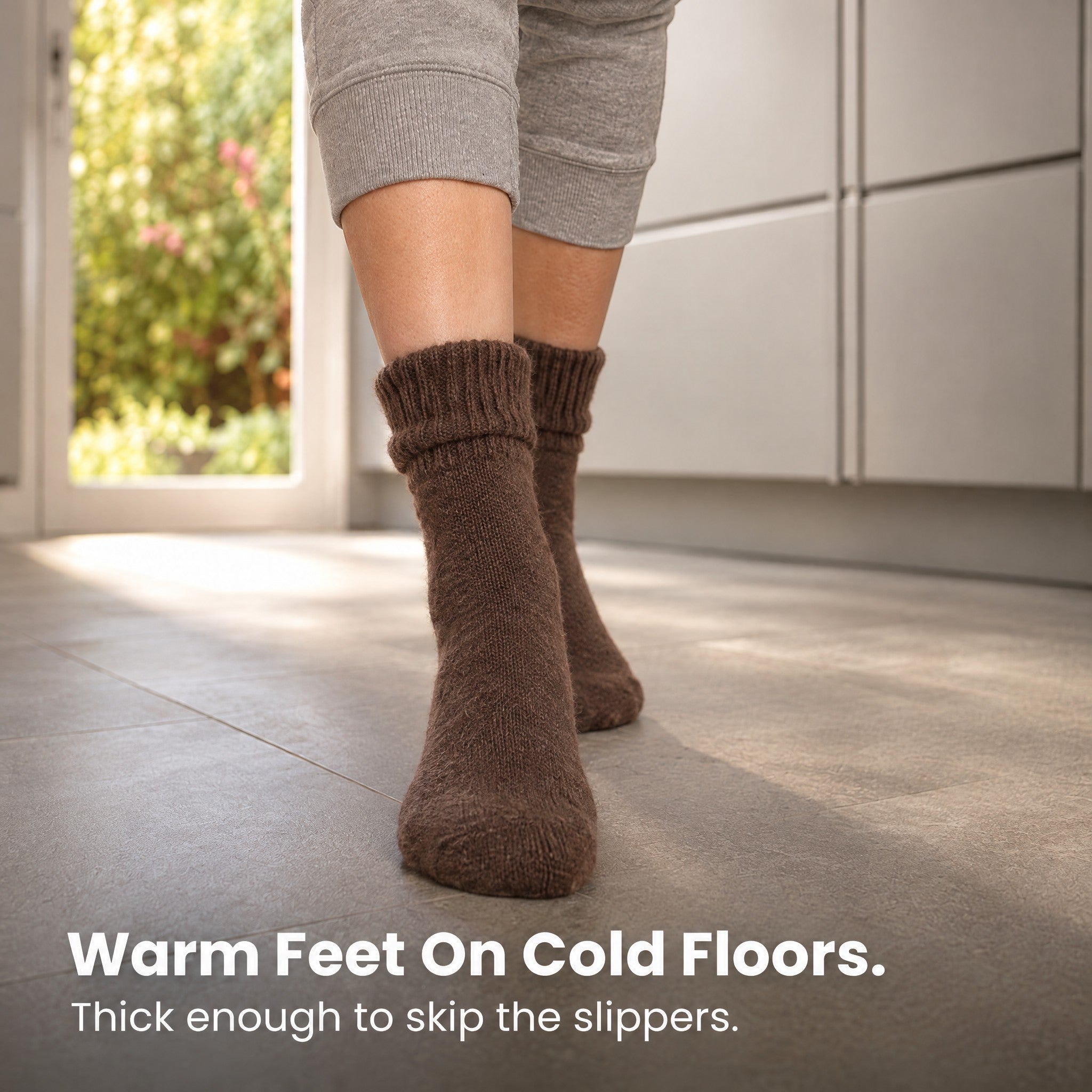 Warm mid-calf sock worn on a hard floor